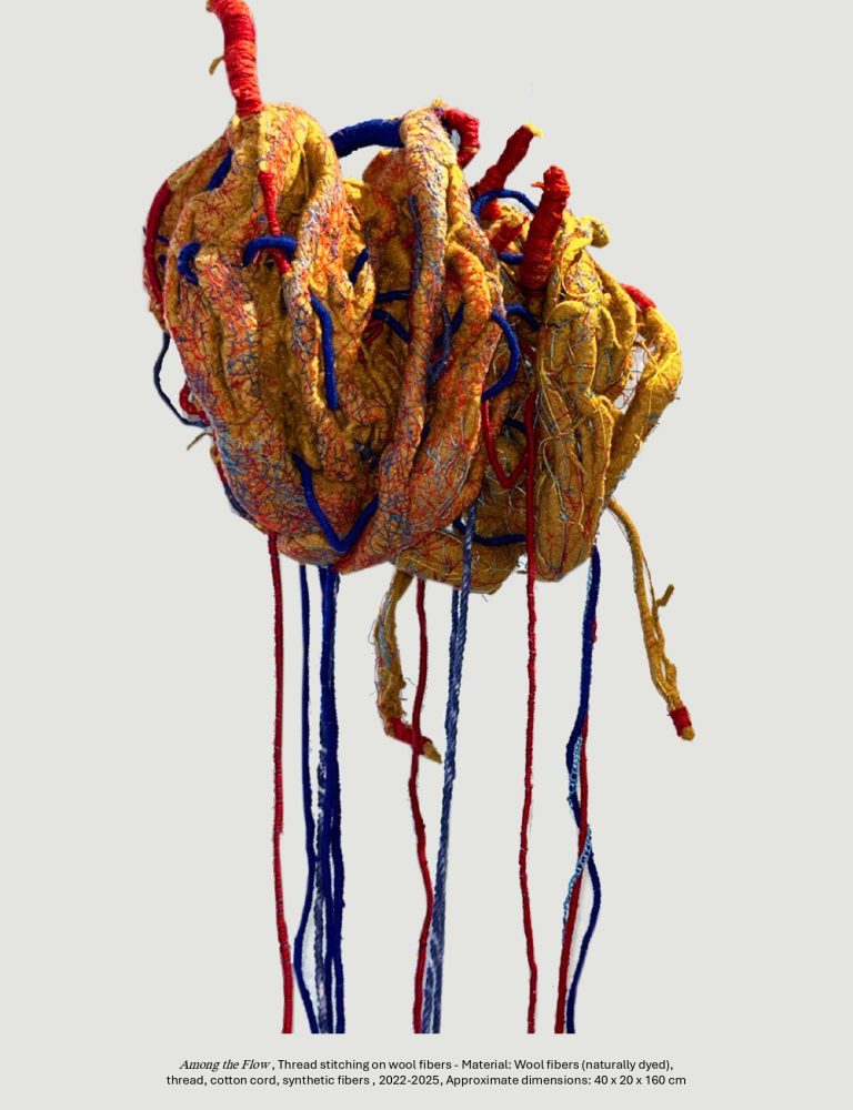 Among the Flow, thread stitching on wool fibers - Material: Wool fibers (naturally dyed), 
thread, cotton cord, synthetic fibers, 2022-2025, Approximate dimensions: 40 x 20 x 160 cm