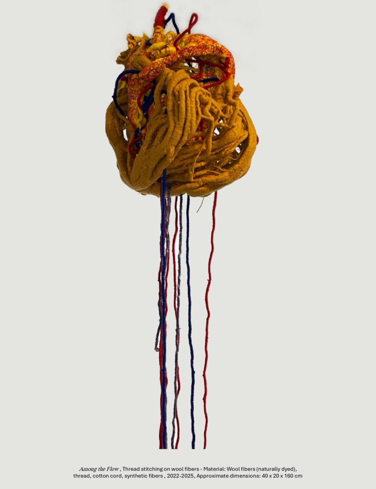 Among the Flow, thread stitching on wool fibers - Material: Wool fibers (naturally dyed), 
thread, cotton cord, synthetic fibers , 2022-2025, Approximate dimensions: 40 x 20 x 160 cm